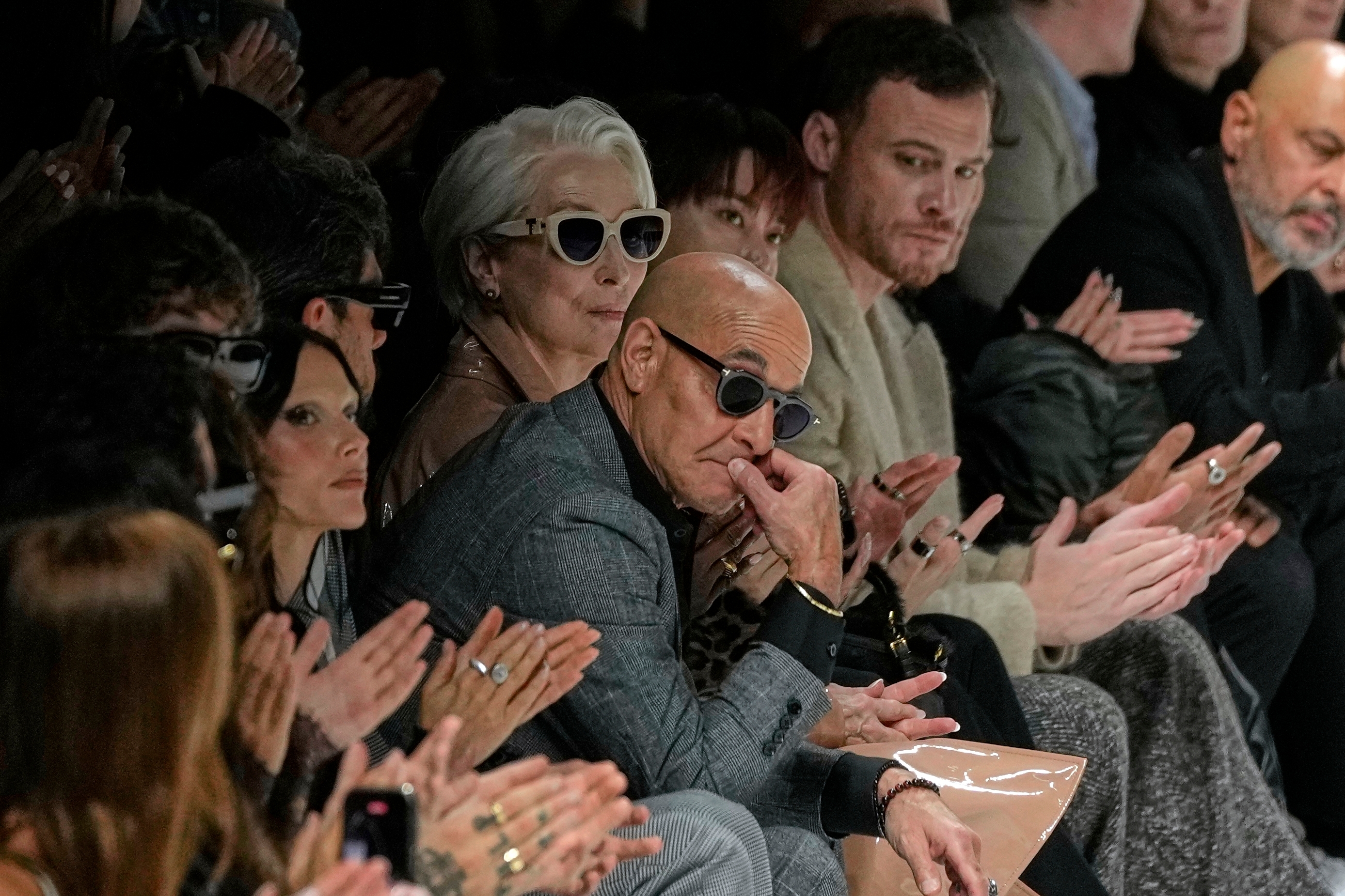 Stanley Tucci, centre left, and Meryl Streep, centre right, attend the Dolce & Gabbana SpringSummer 2026 collection presented in Milan, Italy, Saturday, Sept. 27, 2025. (AP)